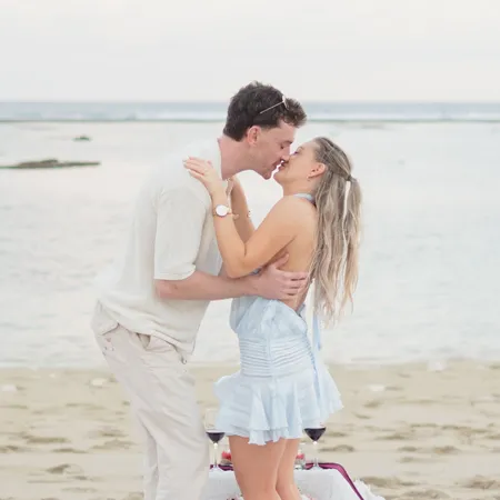 Happy honeymoon couple Anna and Marco from Italy giving review on beach trip with Bali Assist Co