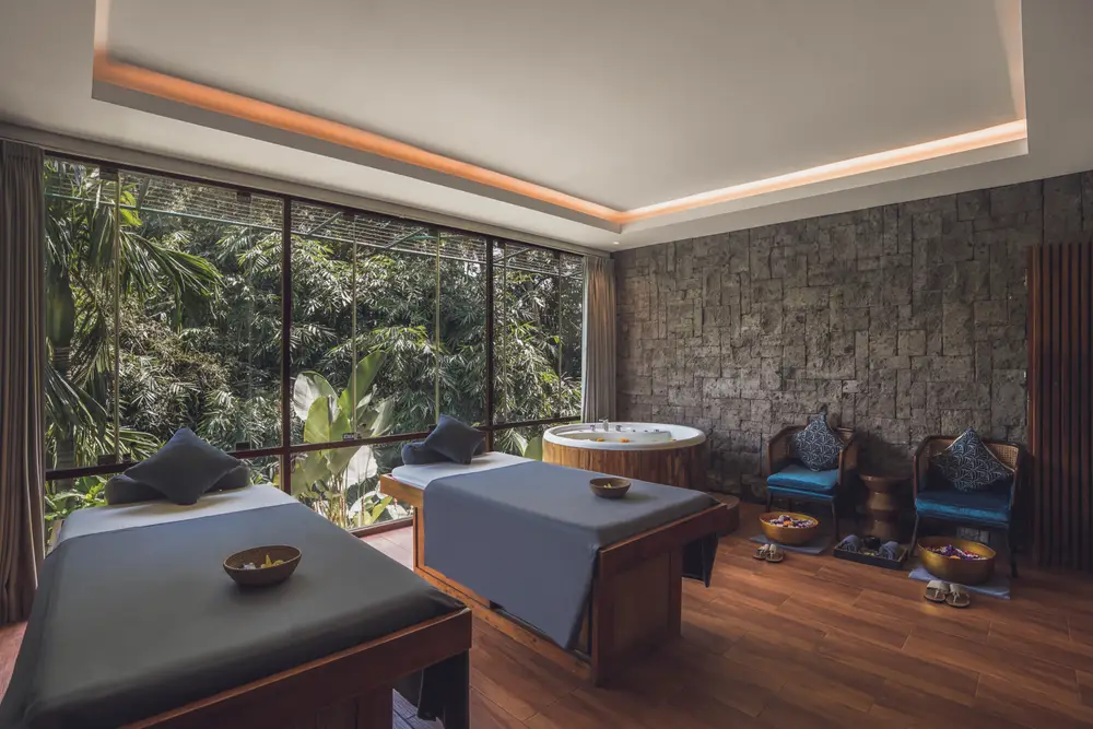 Relaxing luxury spa and wellness massage room with jungle views offered organized by Bali Assist Co luxury tour