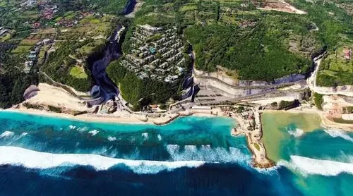 Aerial view of Melasti Beach coastal cliff and turquoise ocean in Ungasan Bali for Day 5 itinerary by Bali Assist Co
