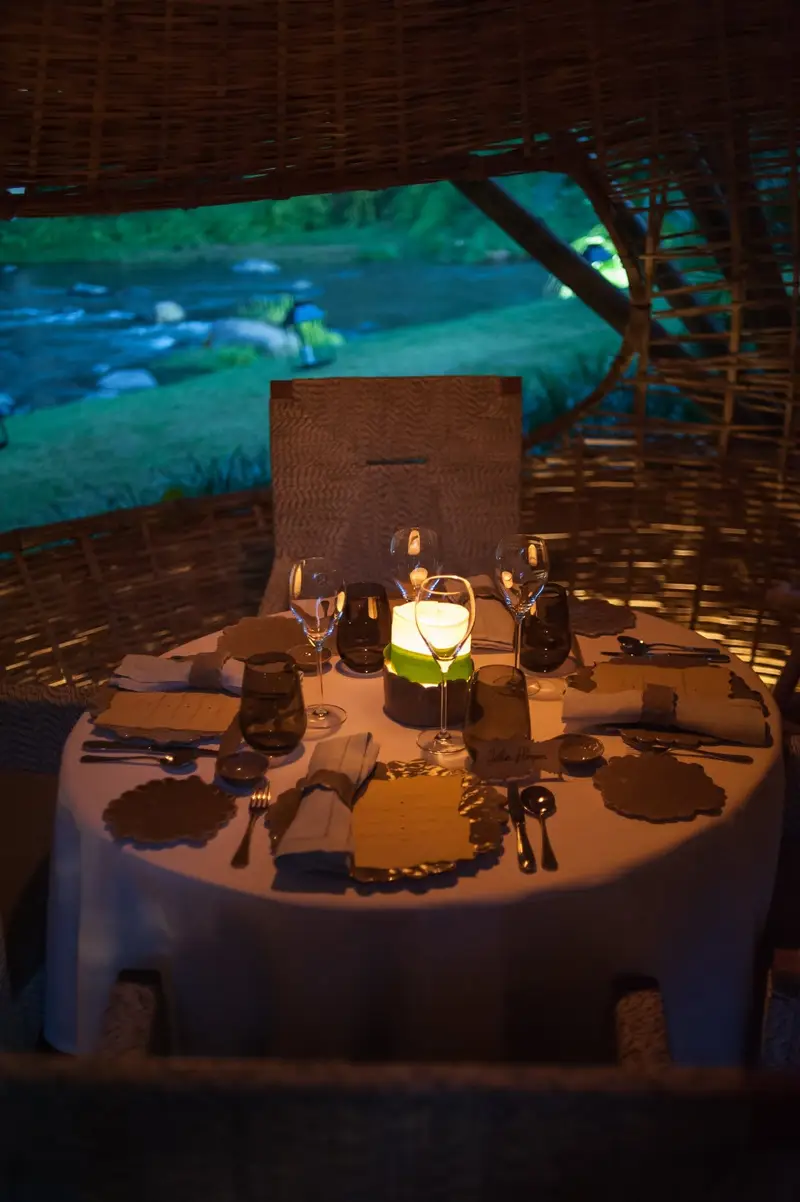 Intimate romantic candlelight fine dining setup for couples managed organized by Bali Assist Co luxury tour