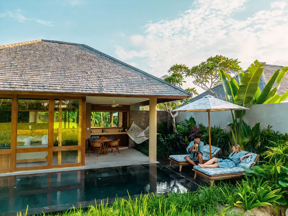 Private pool villa pavilion surrounded by tropical lush greenery in Ubud for The Indulgence by Bali Assist Co