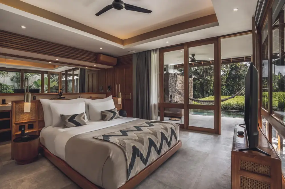 Cozy master bedroom interior in a luxury Ubud villa for Day 1 hotel check-in by Bali Assist Co