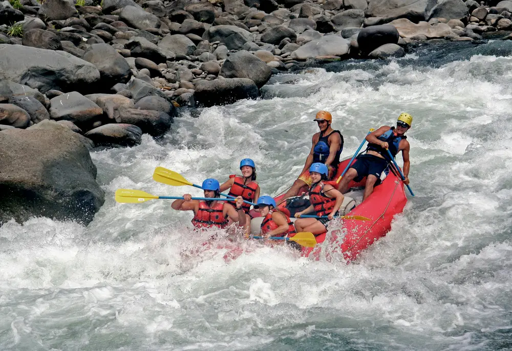 White water rafting adventure through tropical river rapids in Bali by Bali Assist Co